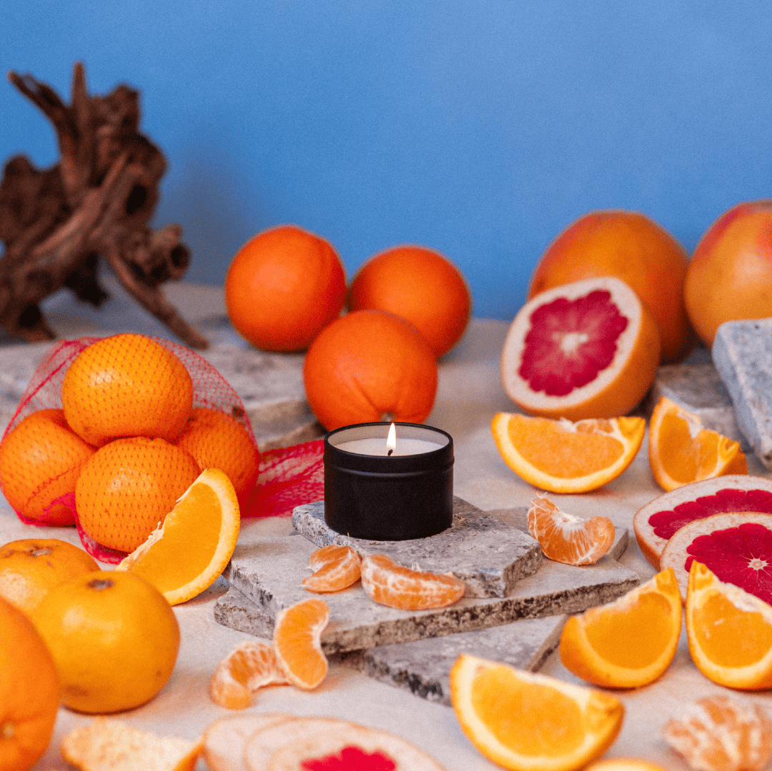 Citrus Splash travel candle burning - fresh citrus scented soy candle - Coastal Decor Company